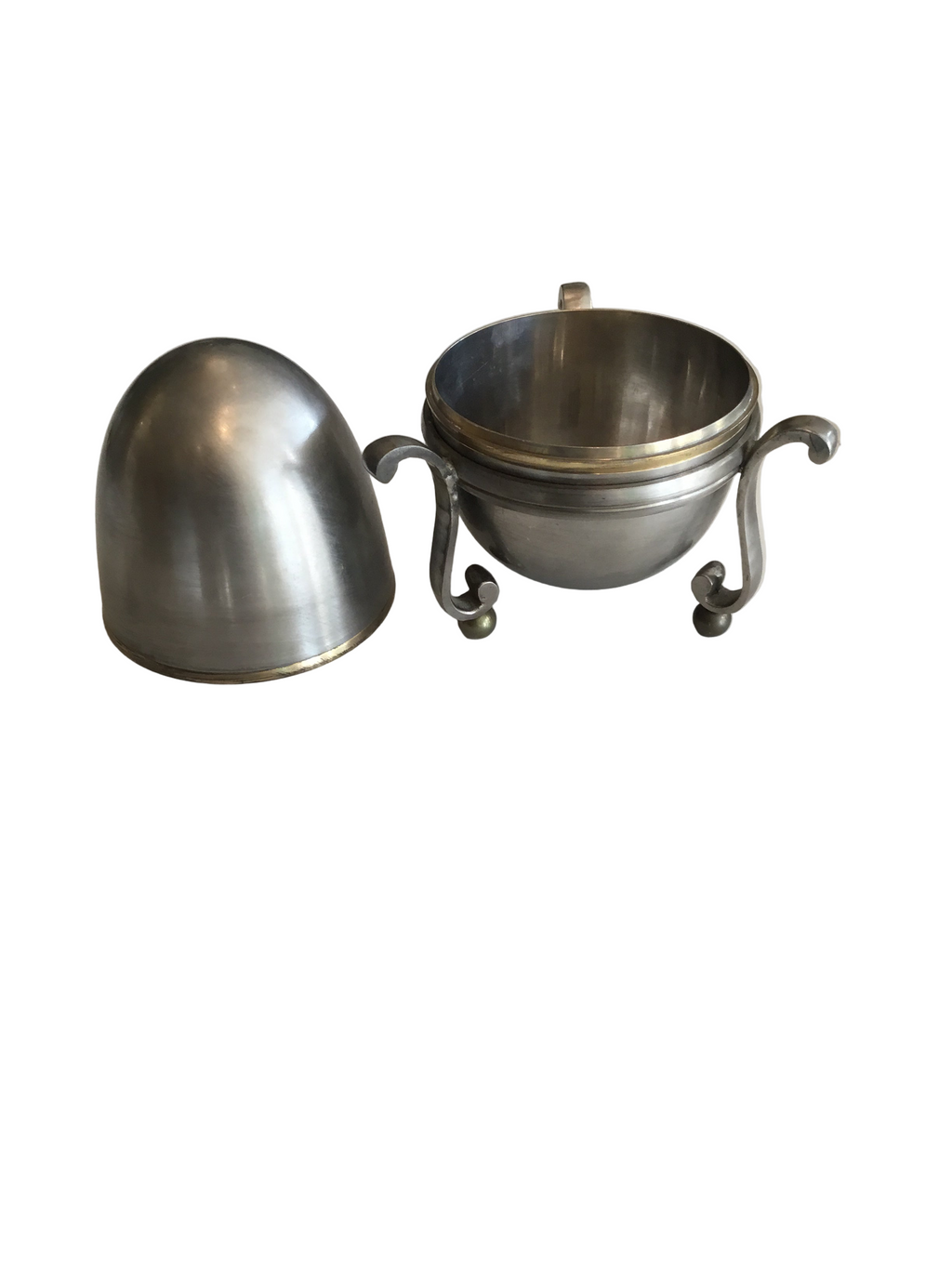 steel and brass egg box on stand