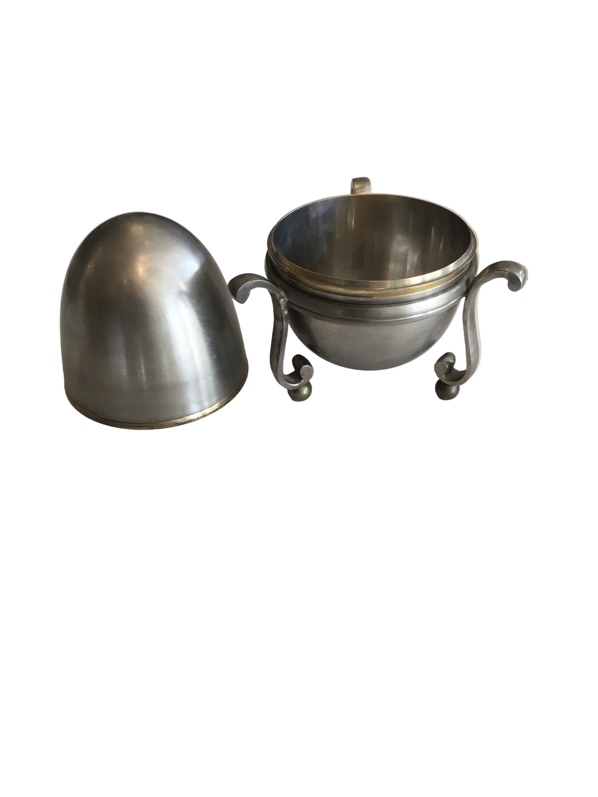 steel and brass egg box on stand