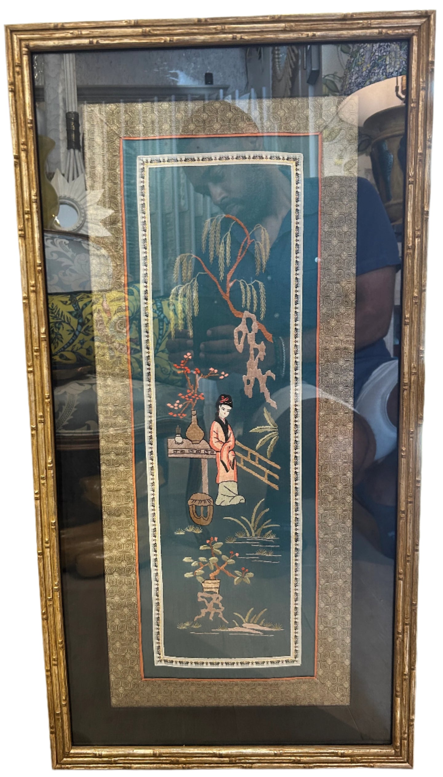 Framed Asian embroidered fabric