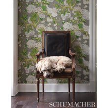 Load image into Gallery viewer, Bermuda Blossoms Wallpaper in an interior setting