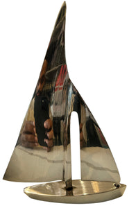 brass sail boat