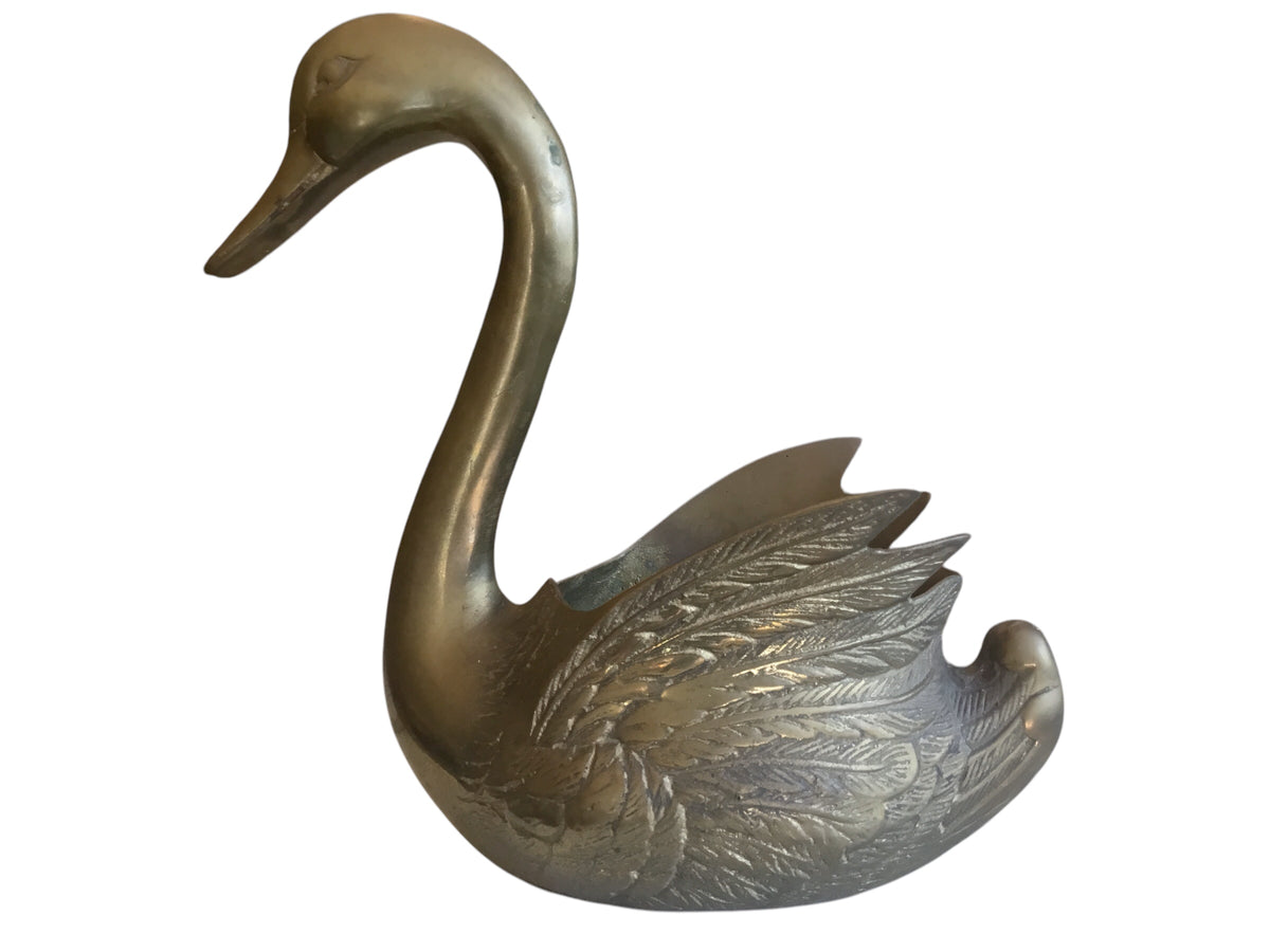 pair of brass swans