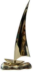 brass sail boat