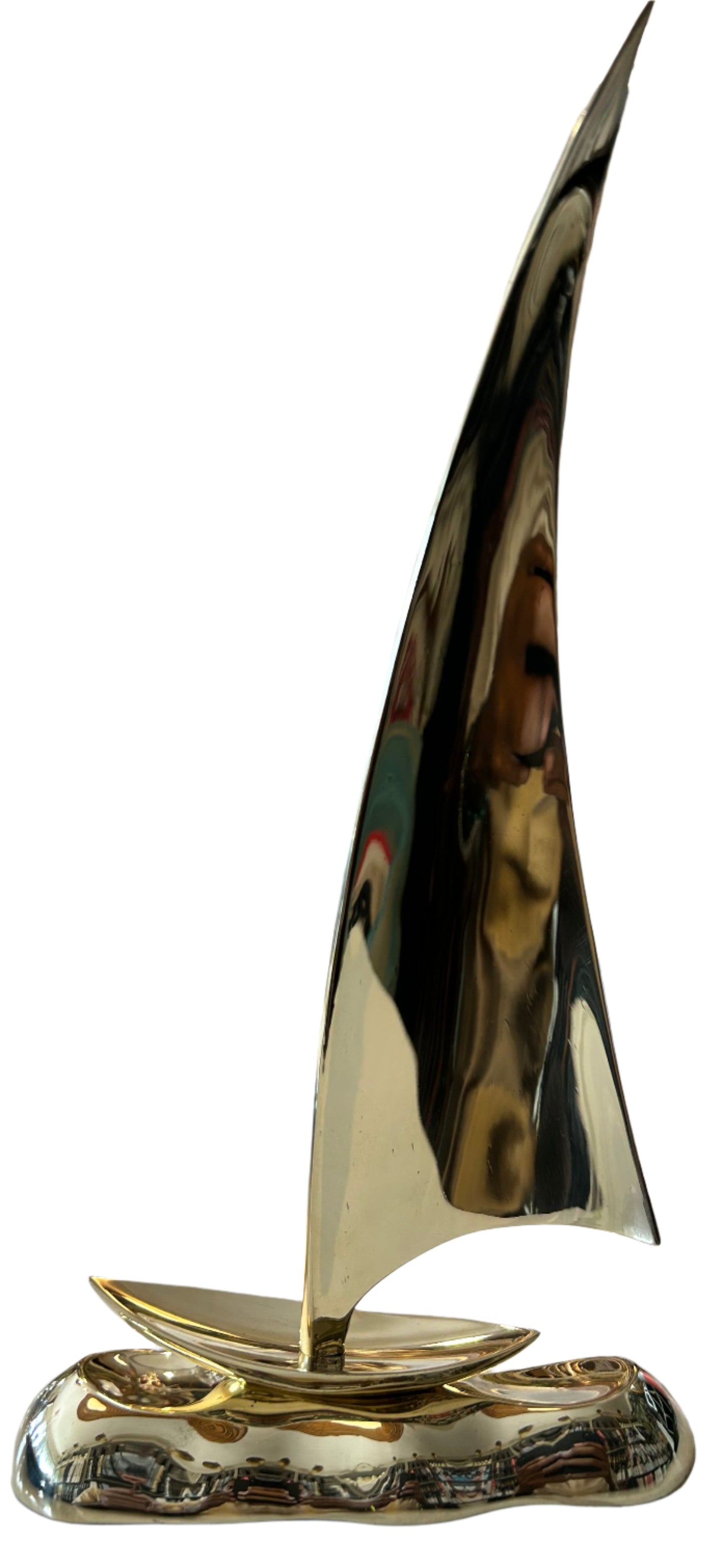 brass sail boat