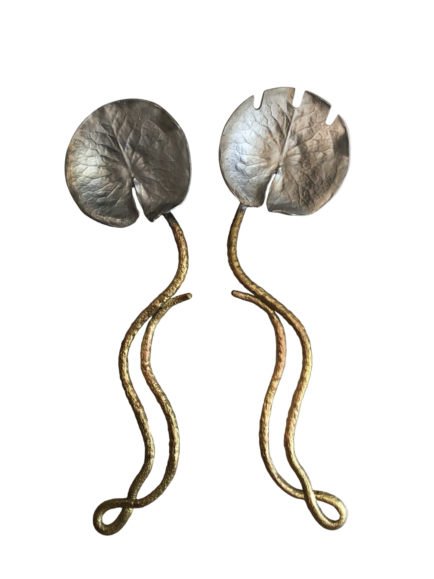 silver and gold lily pad salad utensils