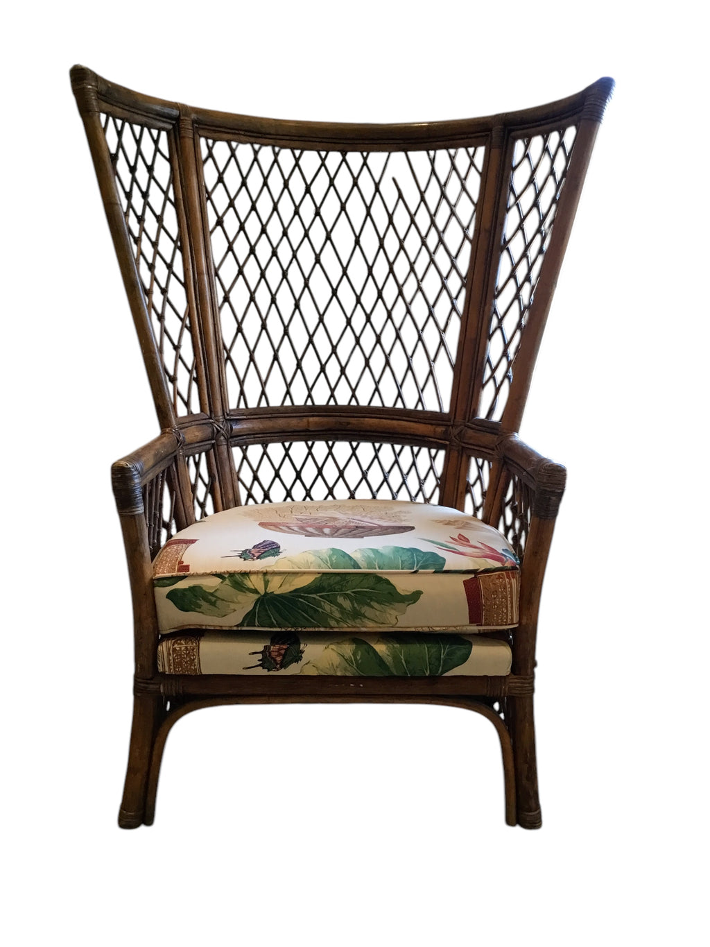 pair of vintage wingback rattan arm chairs