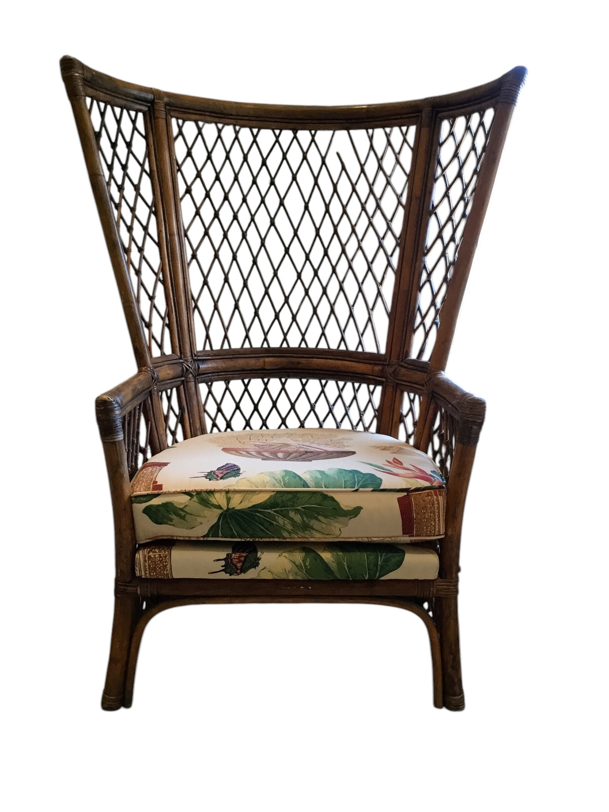 pair of vintage wingback rattan arm chairs