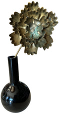 black bud vase with metal flower