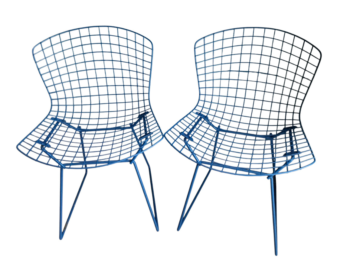 pair blue wire chairs
