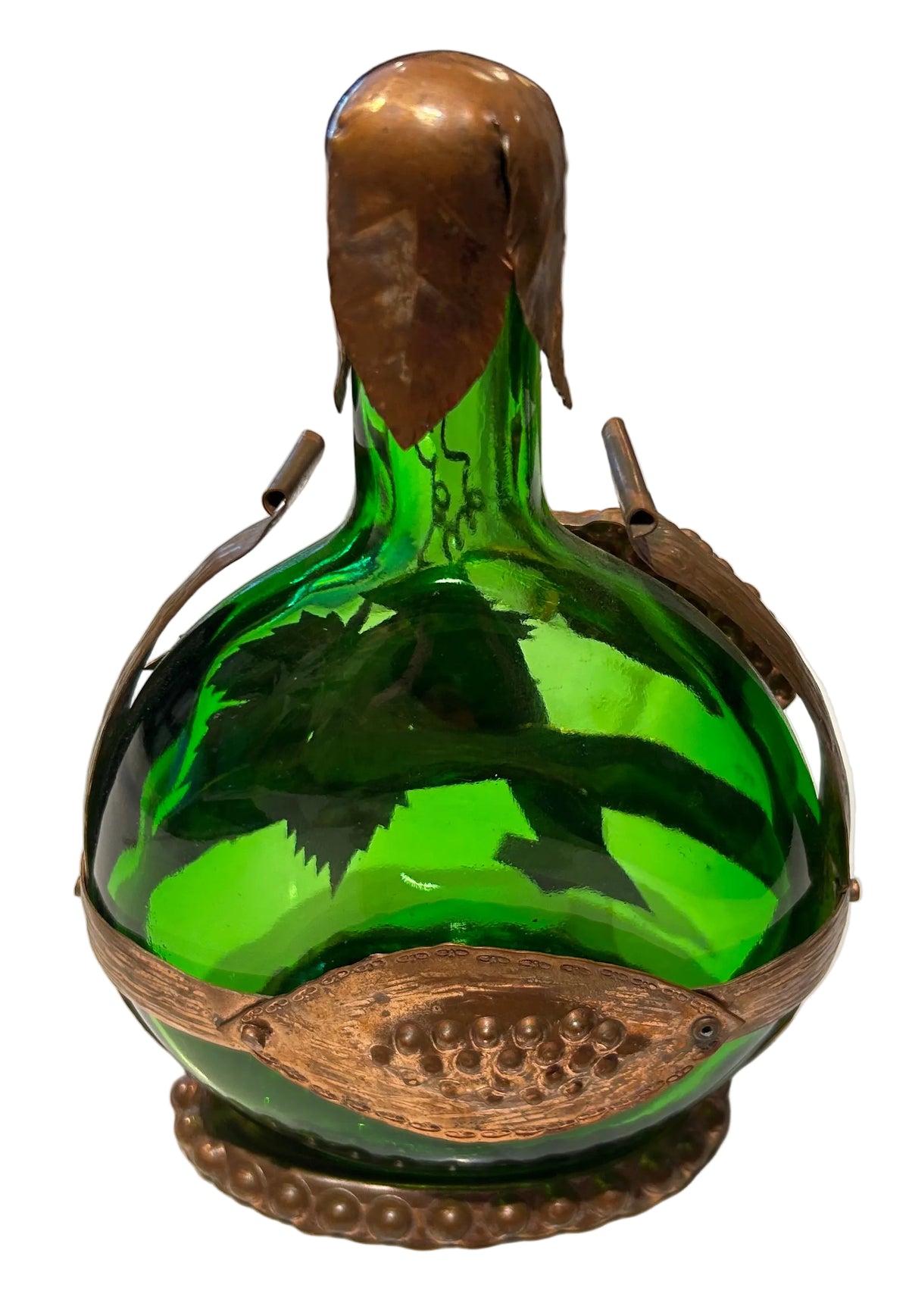 green glass and copper decanter