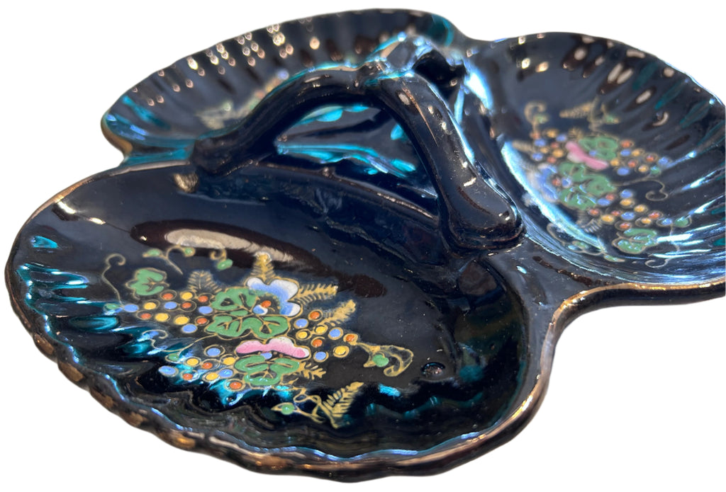 black dish with grape motif