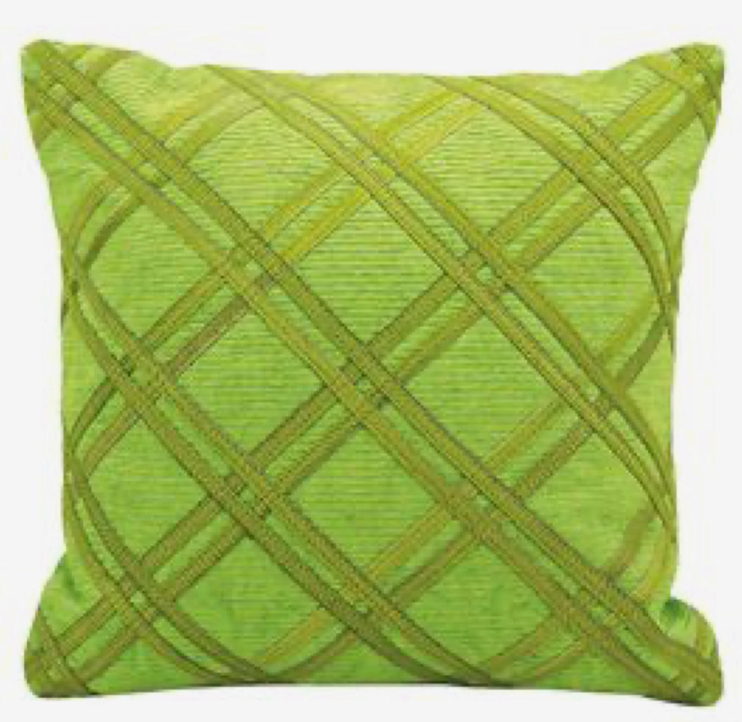 pair of green hide strip pillow