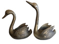 pair of brass swans