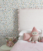 Load image into Gallery viewer, Wild Garden • Dainty Floral Wallpaper • Milton &amp; King USA • Georgia MacMillan • Childrens Wallpaper • Nursery Wallpaper • Bed with pink headboard and pink duvet