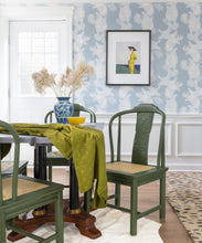 Load image into Gallery viewer, Magpie Wallpaper • Australia Collection by Kingdom Home • Blue Wallpaper • Bird Wallpaper • Photo by Jewel Marlowe • Table setting with two green chairs in front of a wall covered in wallpaper on the top with wainscoting on the bottom