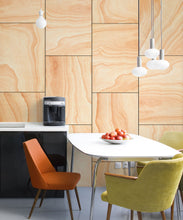 Load image into Gallery viewer, Ply Wood Wallpaper • Light Brown Wallpaper • Wood Grain Wallpaper insitu with green chair and orange chair around a small white table