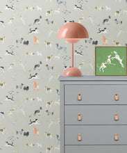 Load image into Gallery viewer, Doggies Wallpaper • Dog Wallpaper • Beige • Insitu with dresser and lamp