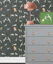 Load image into Gallery viewer, Doggies Wallpaper • Dog Wallpaper • Charcoal • Insitu with grey dresser and salmon lamp