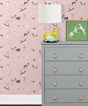 Load image into Gallery viewer, Doggies Wallpaper • Dog Wallpaper • Pink • Insitu with grey dresser