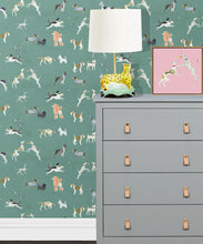 Load image into Gallery viewer, Doggies Wallpaper • Dog Wallpaper • Turquoise • Insitu with grey dresser
