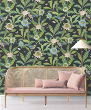 Load image into Gallery viewer, Summer Garden Wallpaper • Charcoal Wallpaper • Floral Wallpaper Insitu with pink sofa