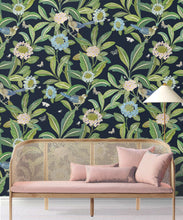 Load image into Gallery viewer, Summer Garden Wallpaper • Original Wallpaper • Floral Wallpaper Insitu behind pink couch