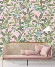 Load image into Gallery viewer, Summer Garden Wallpaper • Pink Wallpaper • Floral Wallpaper insitu behind pink sofa