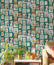 Load image into Gallery viewer, Seed Packets Wallpaper featuring watermelon, carrot, beet, beans, poppy, daisy • Teal • Insitu