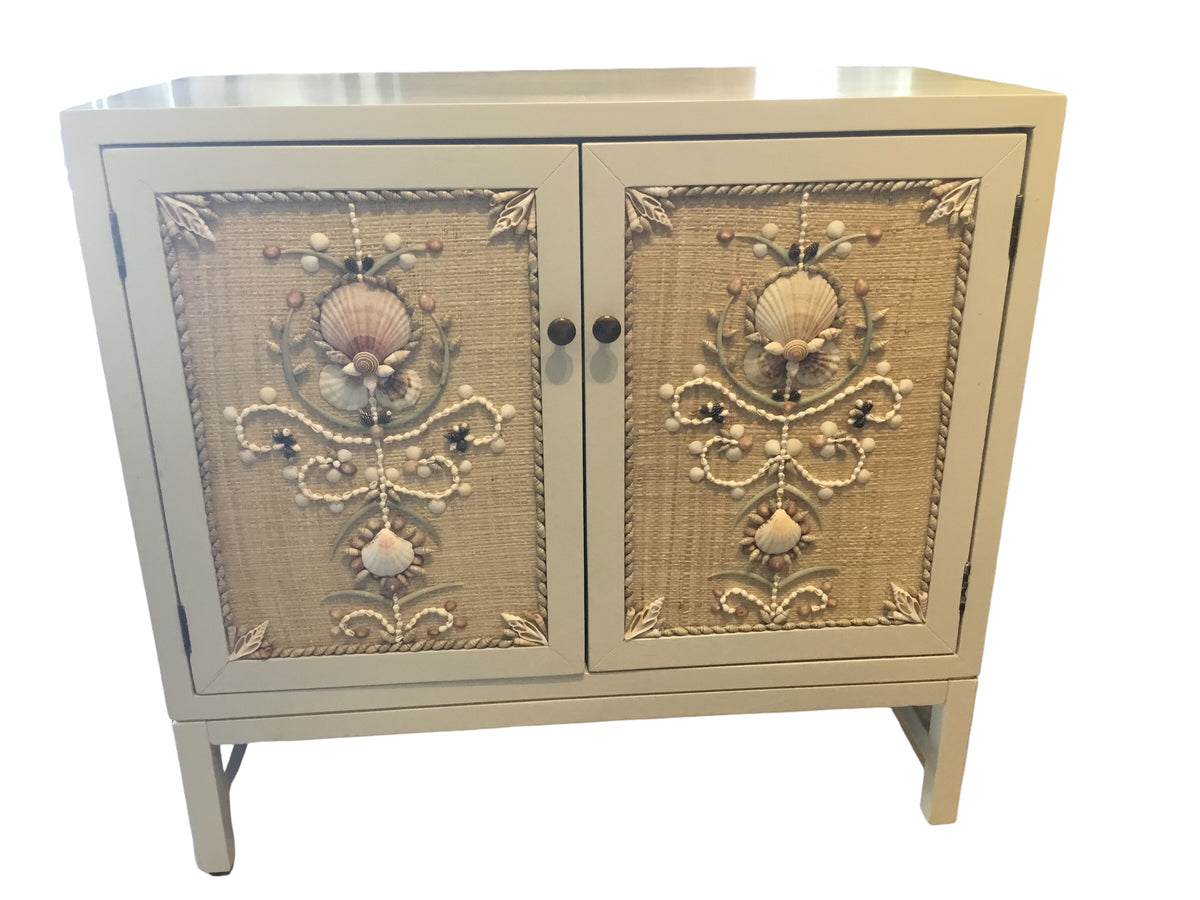 raffia and seashell two door cabinet
