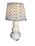 pair of white lamps with blue flower shade