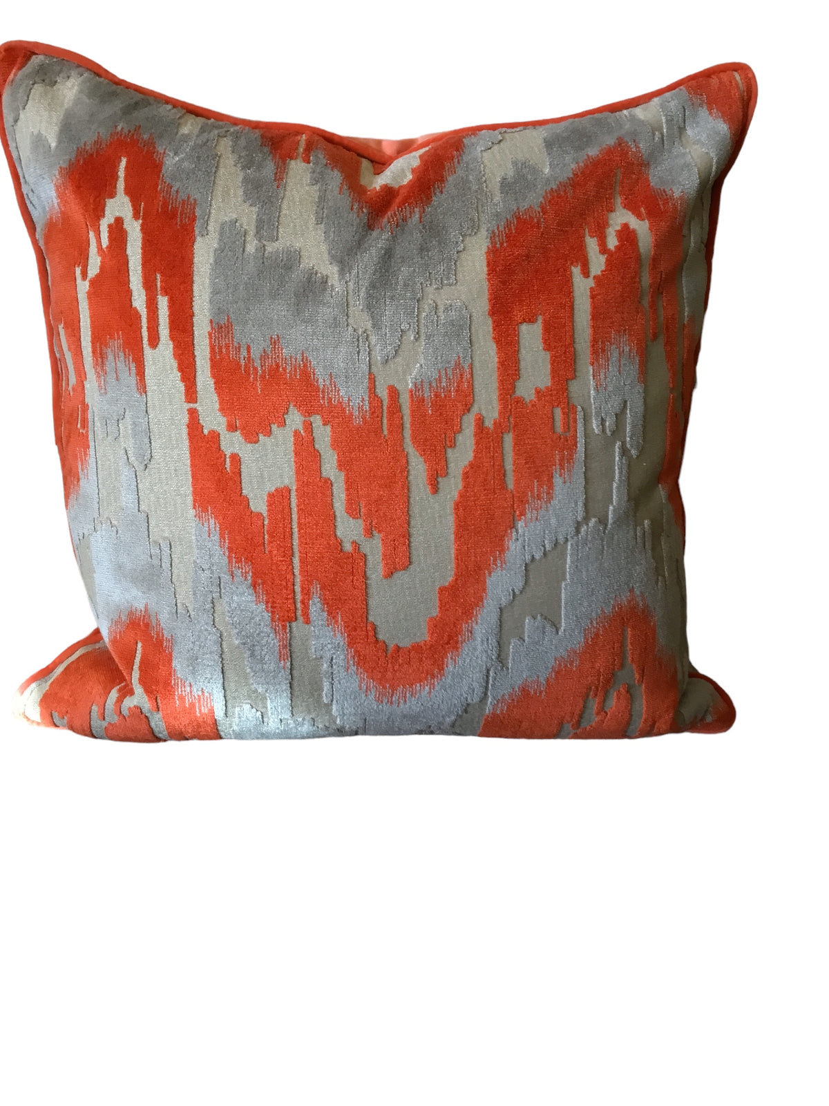 pair coral and grey ikat pillow
