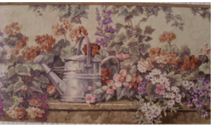 Border w/watering can and flowers. PKB1238